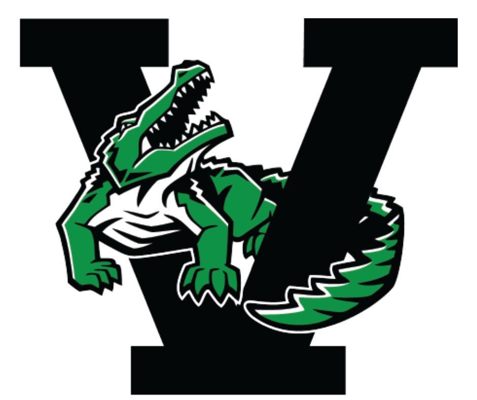 Vicksburg High School's logo. The letter V with a green gator peeking through.